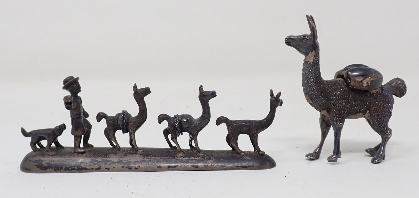 Llama Figures: Tallest is apprx 2 3/8". Seem to be made of pewter or silverplate ??