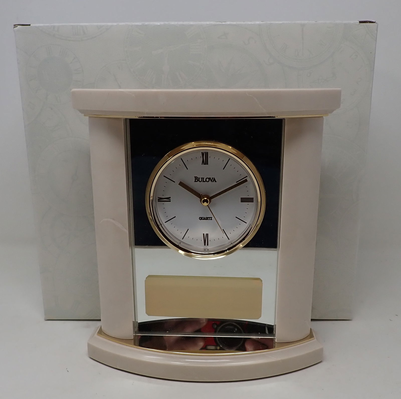 Bulova Marble Clock: Approx 2 3/4" x 7 7/8" x 8 3/4" tall.