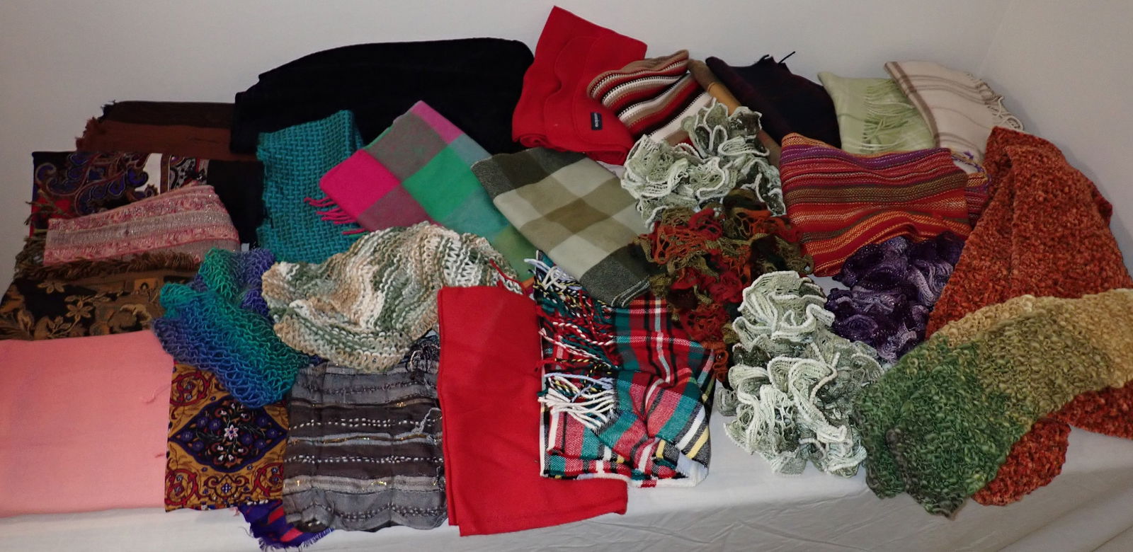 2 Tables Full of Scarves: Shipping is available for this lot