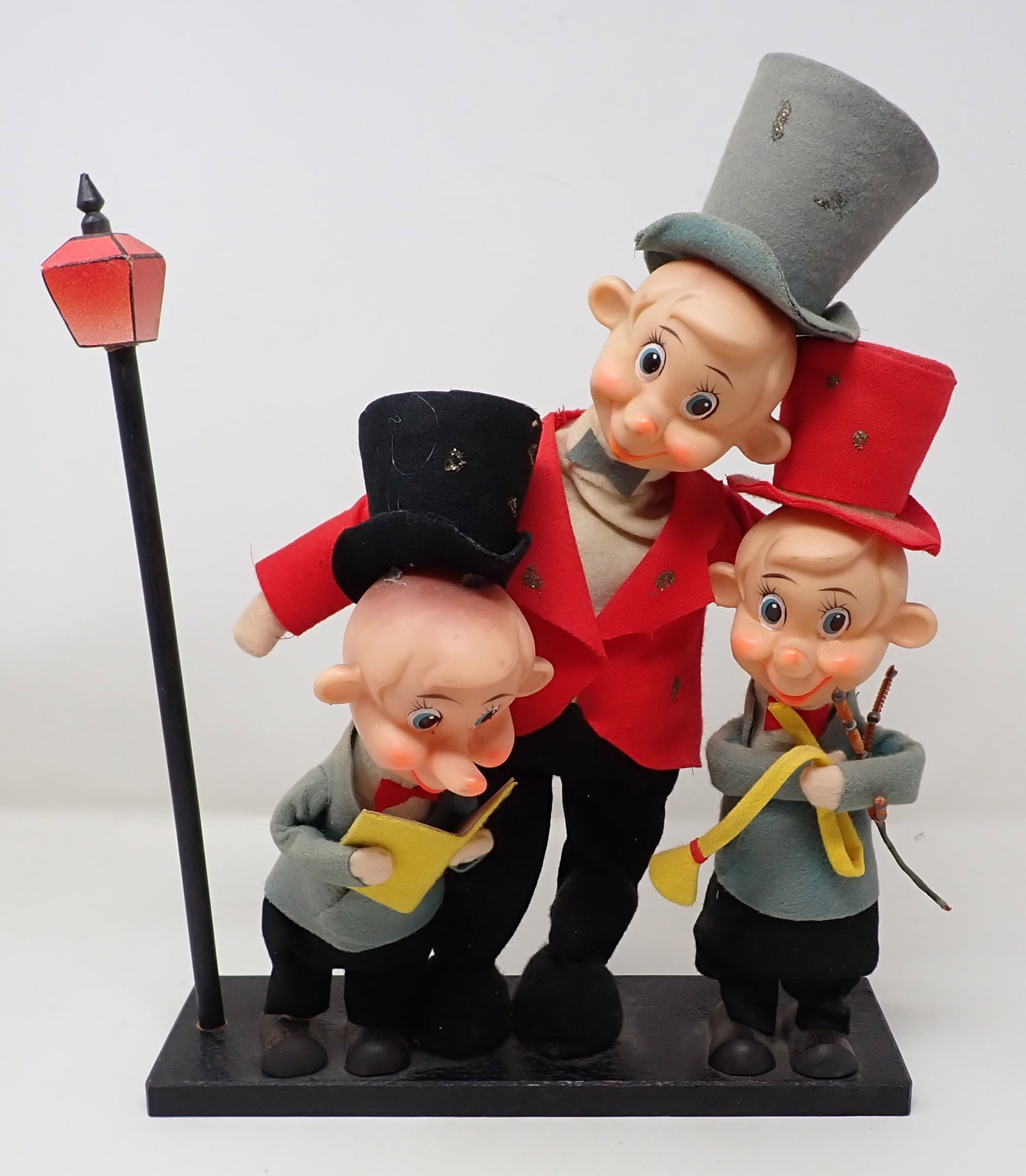 Musical Carolers: Approx 10 7/8" long and 14" tall.