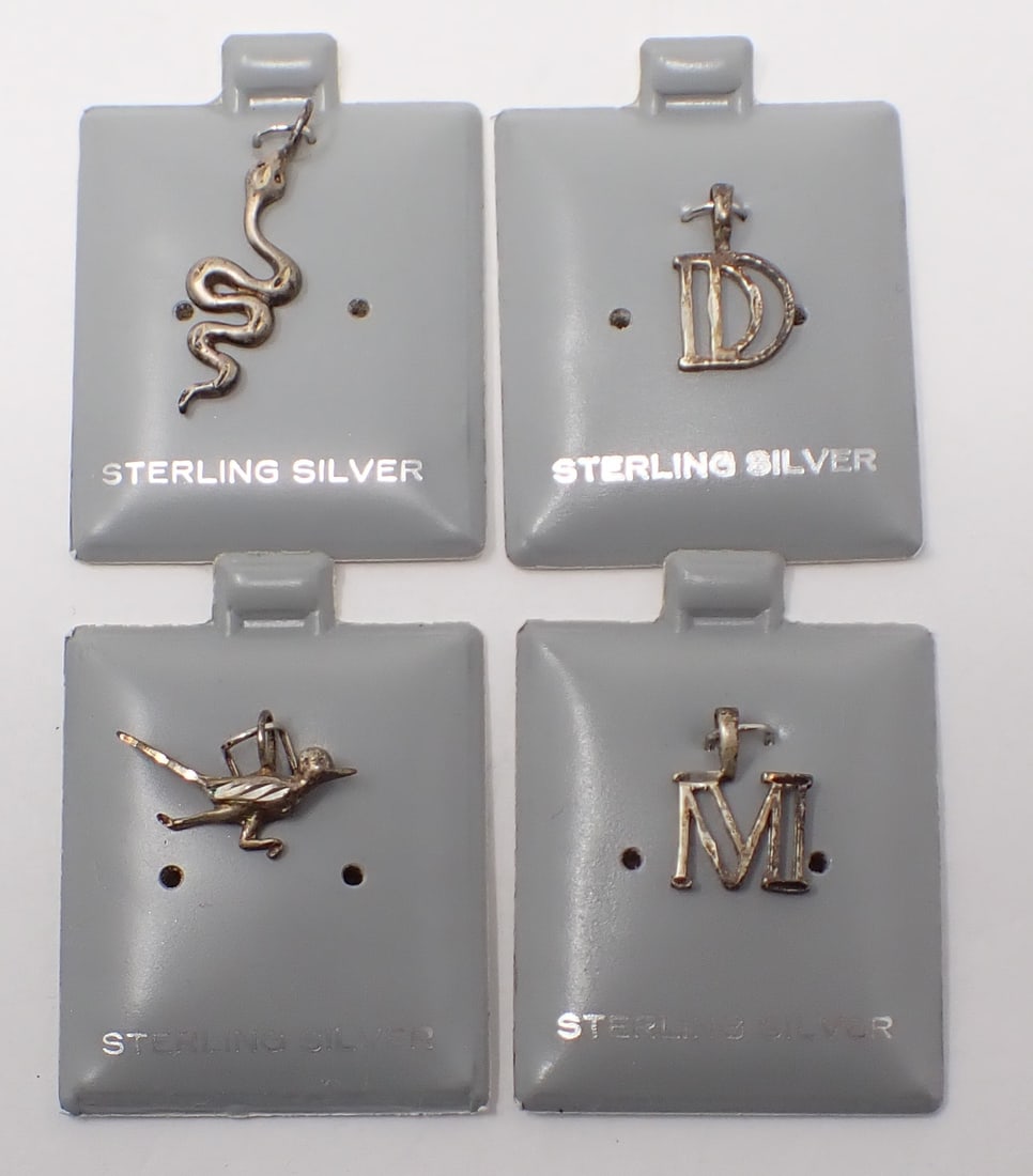 4 Sterling Charms on Original Cards: Charms include the letter M, letter D, snake and a road runner