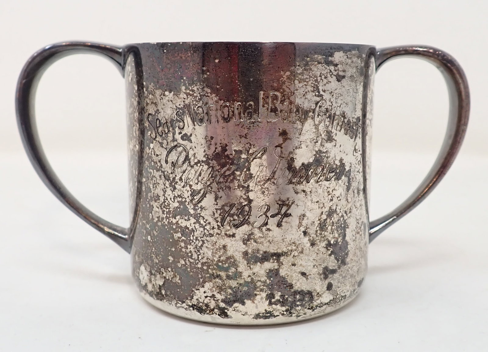 1934 Sears National Baby Contest Cup: Homan Silverplate Cup is apprx 4 1/2" handle to handle and 2 1/2" tall
