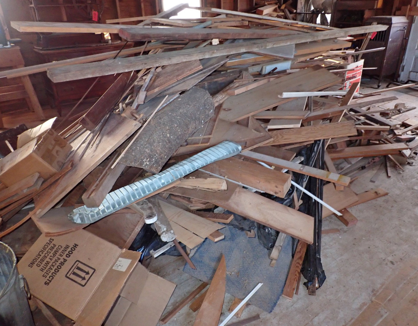 3 Piles of Scrap Lumber: This is for the lumber on the floor only ! This is located on the second floor. You can lower it out a set of double doors, but you WILL NEED to have a person down below, to make sure no one walks aro