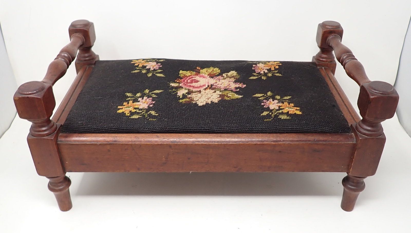 Needlepoint Footstool: Foot Stool is approx 10" x 17 3/4" x 8 1/4" tall.