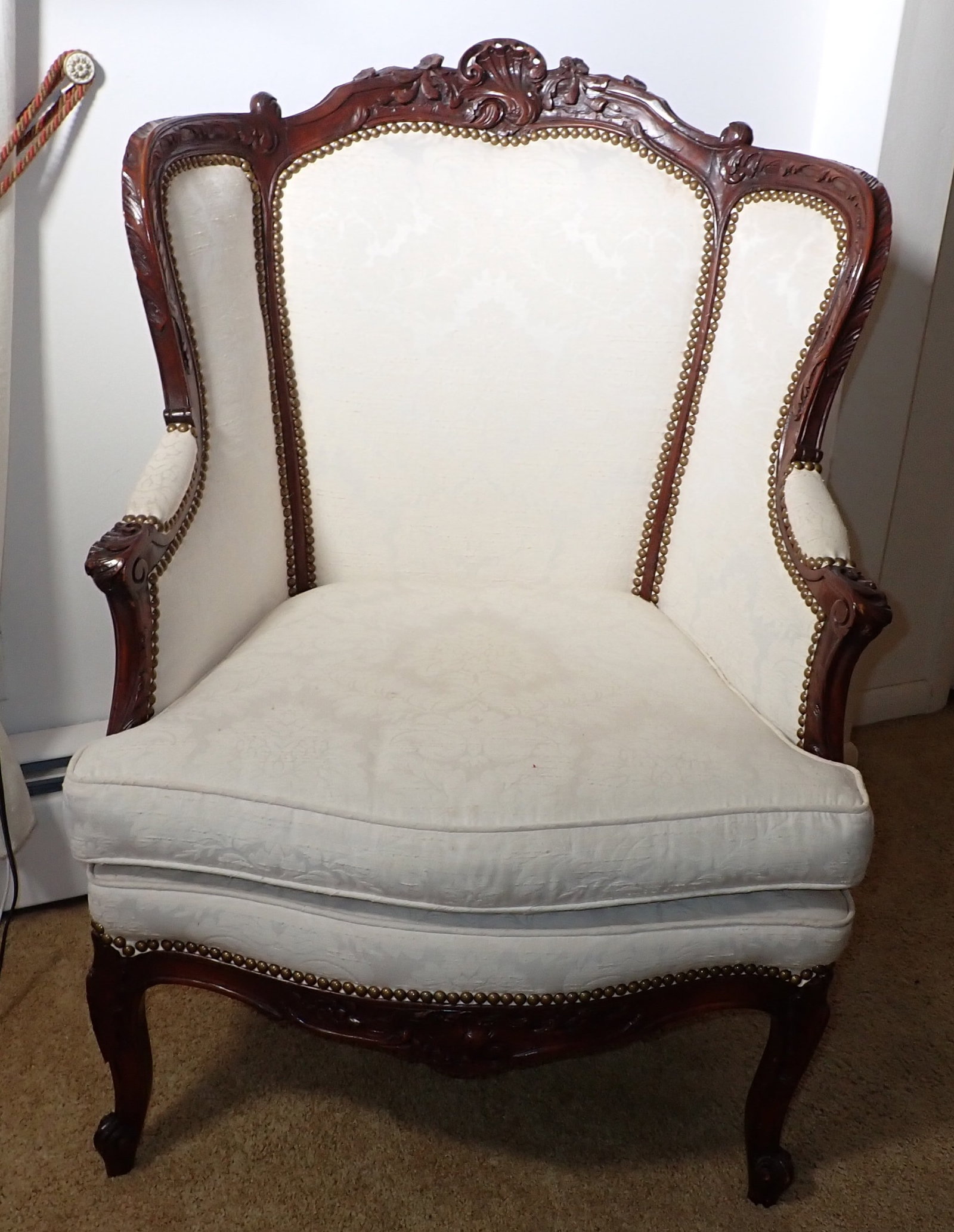 Carved Wing Chair: Approx 27 1/2" wide, 18 1/2" to seat, 21" deep, 40 1/2" tall. No shipping ! Bring help to remove from house !