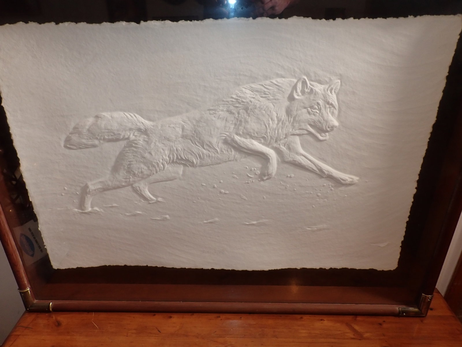 Linda Shaw Blind Embossed Artic Wolf Wall Art: Signed and numbered. Frame is approx 3 1/2" x 41" x 30 1/2". NO SHIPPING