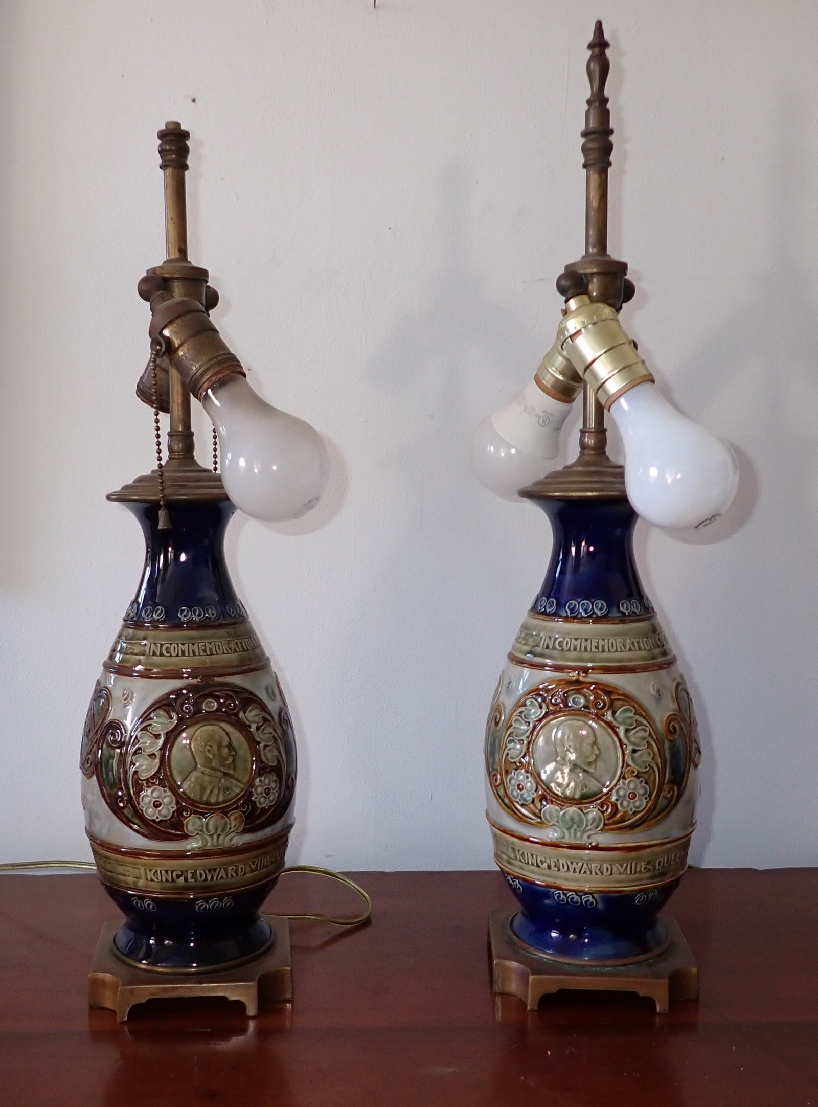 Doulton Lambeth King Edward VII Queen Alexandra Coronation Lamps: Coronation Lamps - Pottery Coronation Lamps. Total height of one with finial is approx 22 7/8". Pottery is apprx 11" tall. If shipping is needed contact UPS Store 5528 , to get a shipping quote before