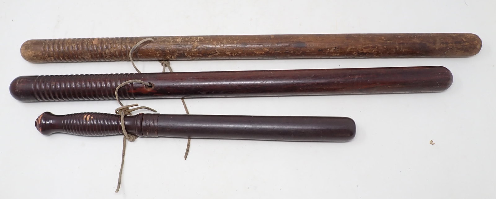3 Billy Clubs: Longest is apprx 1 1/8" in diameter and 23 3/4" long. Front one comes apart and is hollow.