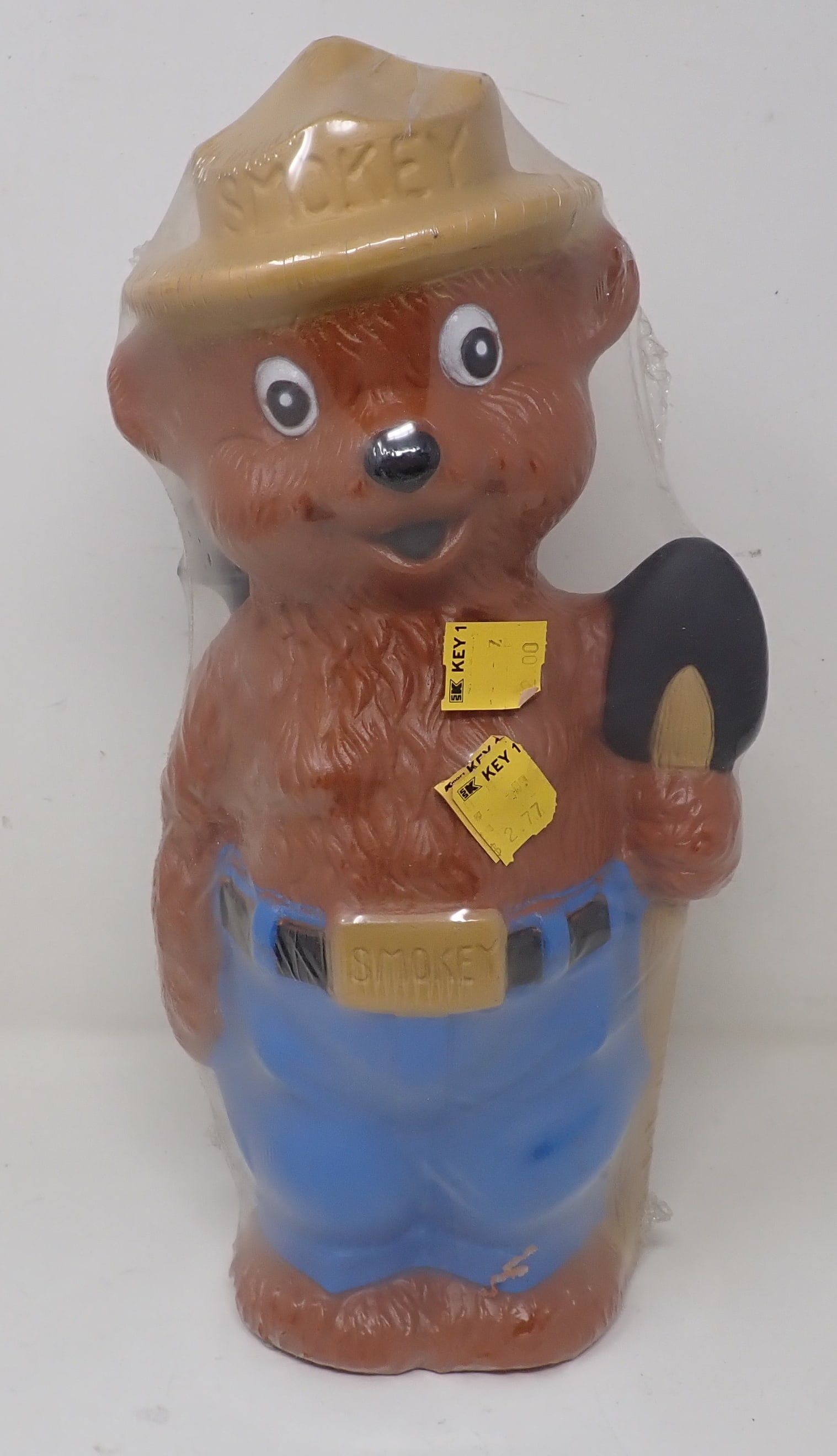 Smokey The Bear Yard Ornament: Made of plastic . Apprx 13 1/2" tall