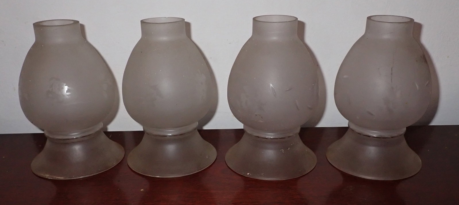 Set of 4 Frosted Shades: Apprx 4 1/2" in diameter and 7" tall. Fitter is apprx 2" in diameter. NO SHIPPING