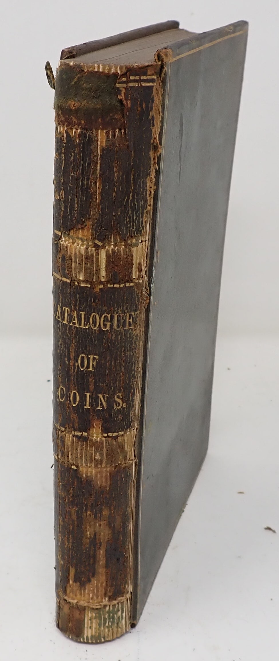 Catalog of Coins: Approx 5 1/2" x 7 3/4" x 1 1/4" . It is approx 3/4 full of writing