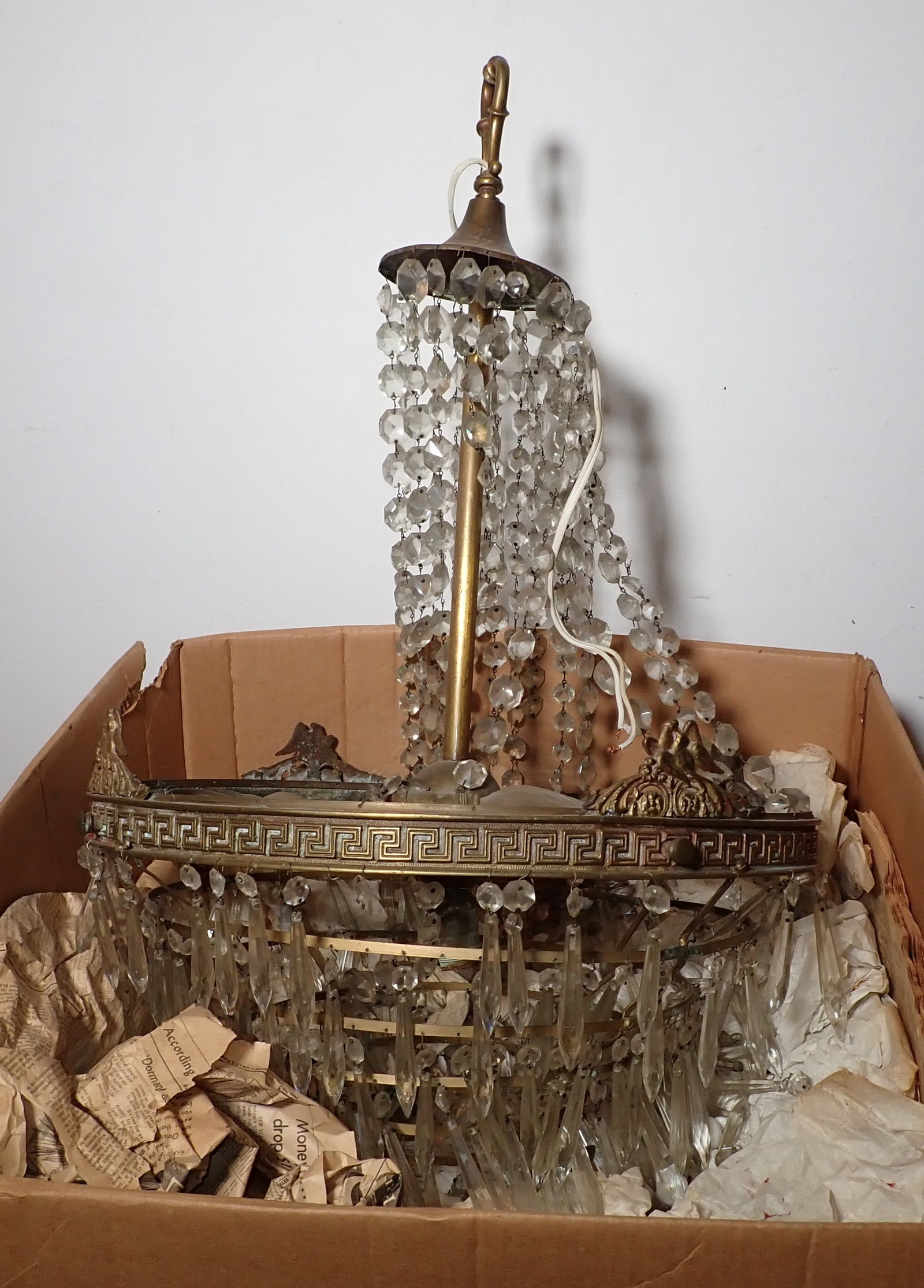 Brass Chandelier: Apprx 20 1/2" in diameter and 31 1/2" long. We do not guarantee all the prisms are there. NO SHIPPING !