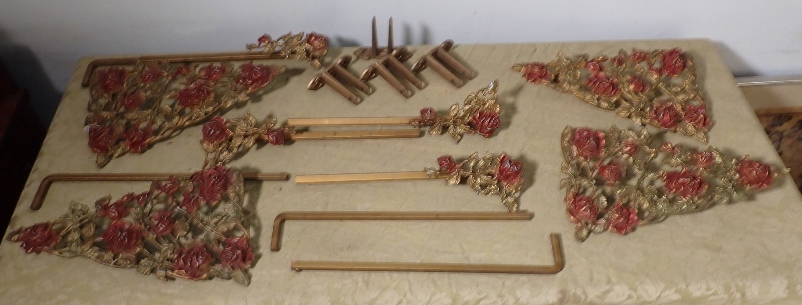 Rose Pattern Curtain Hardware: Roses are made of possibly aluminum. End pieces are approx 7 1/4" x 12 1/2"