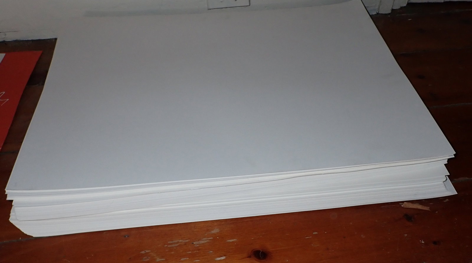 Stack of Art Paper: Size is approx 22 5/8" x 28 5/8" . Stack is apprx 3 3/8" tall. NO SHIPPING ! Buyer to remove from second floor