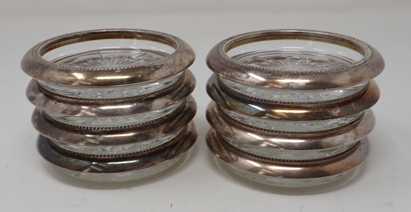 Set of 8 Glass Coasters w/ Leonard Silverplate Bands: Coasters w/ Leonard silverplate bands are approx 4" in diameter