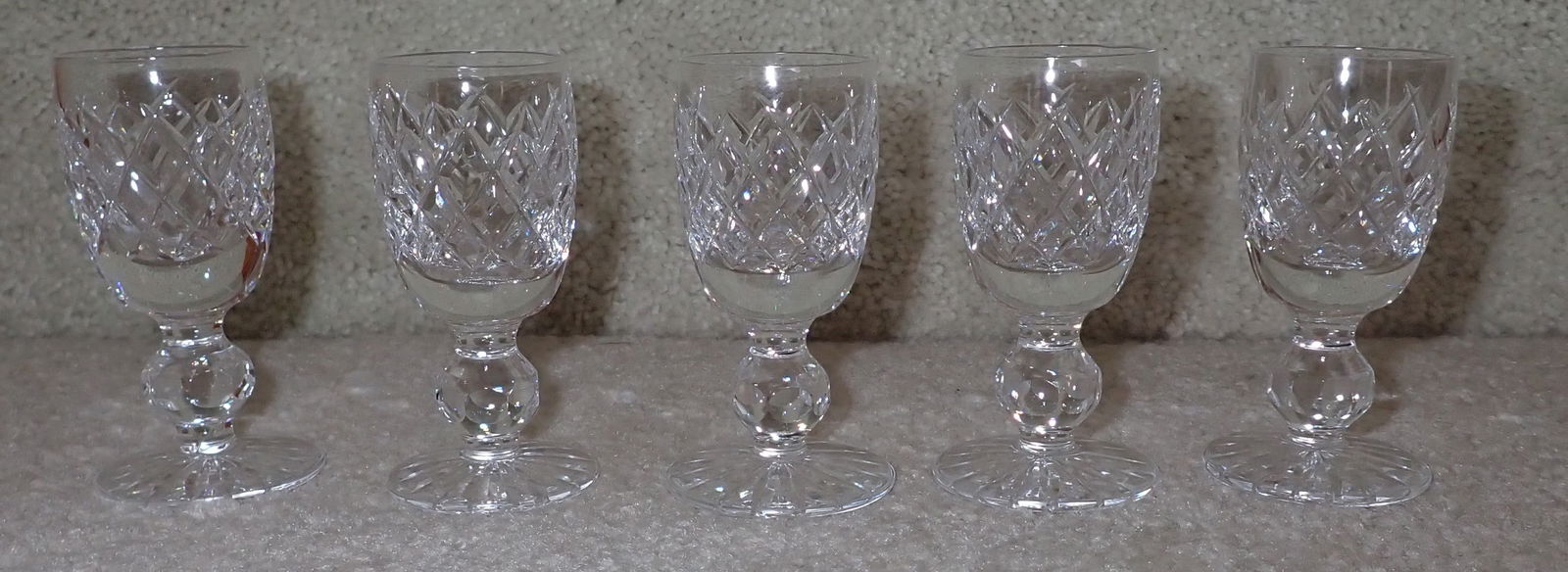 5 Waterford Cordial Cups: Apprx 1 1/2" in diameter and 3 3/8" tall.
