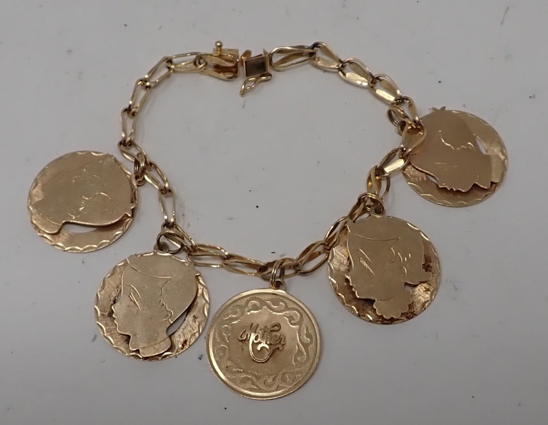 1960's Wagner 14k Gold Charm Bracelet: Approx 8" total length. Charms are approx 1" in diameter. Total weight is approx 15.49dwt