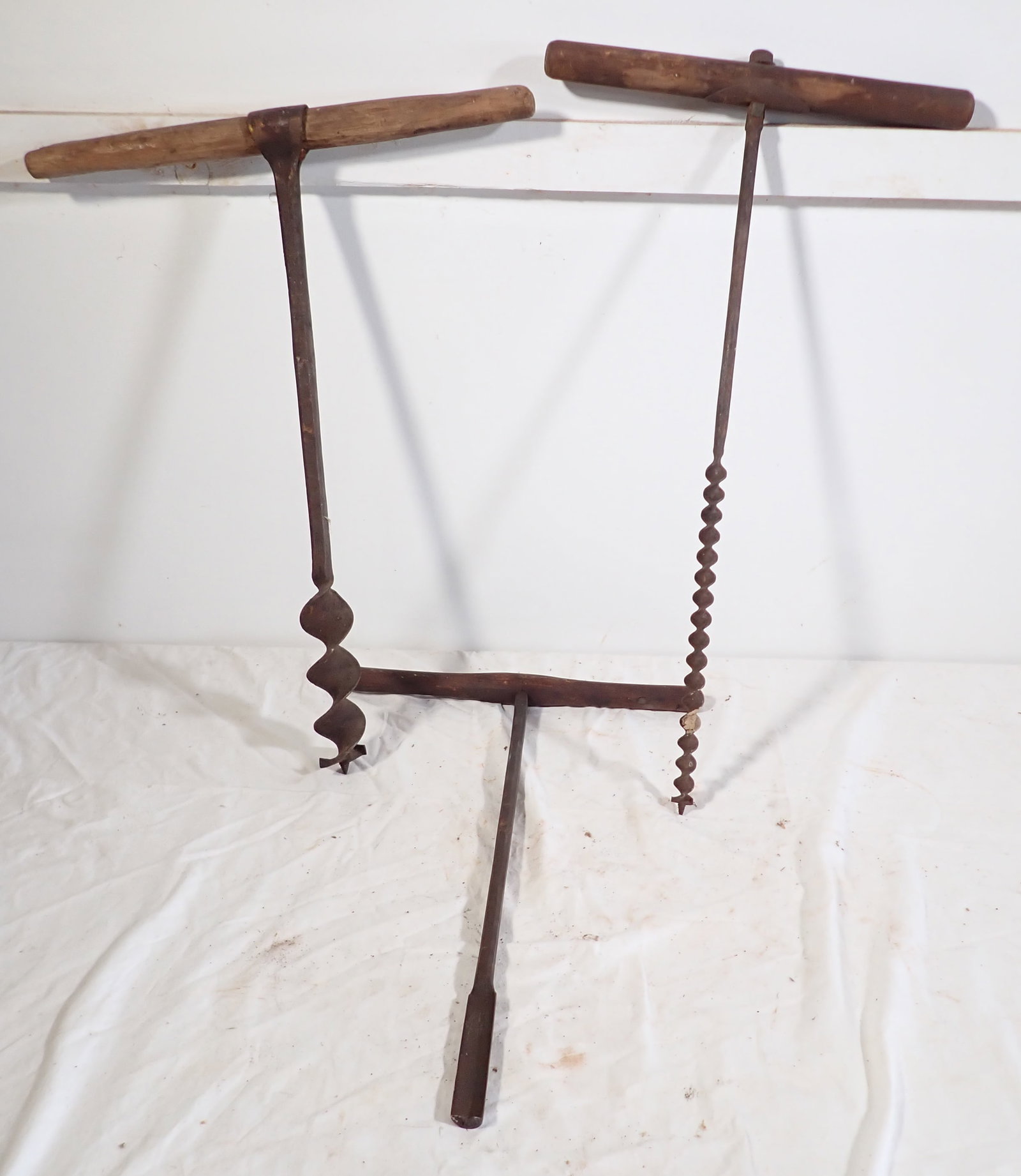 3 Hand Augers: Largest is apprx 2" in diameter and 22 1/4" long. No shipping