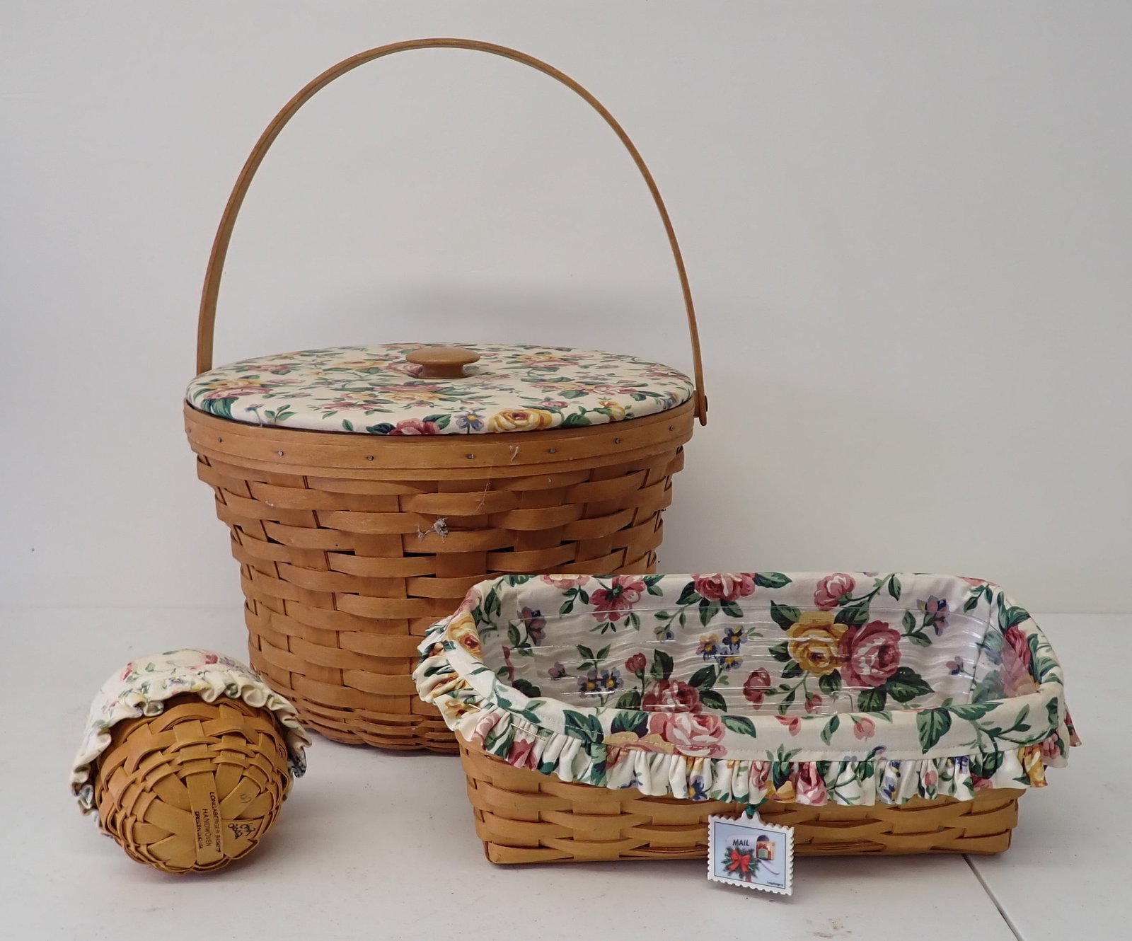 3 Longaberger Baskets: Largest is approx 13" in diameter and 9 1/2" tall.