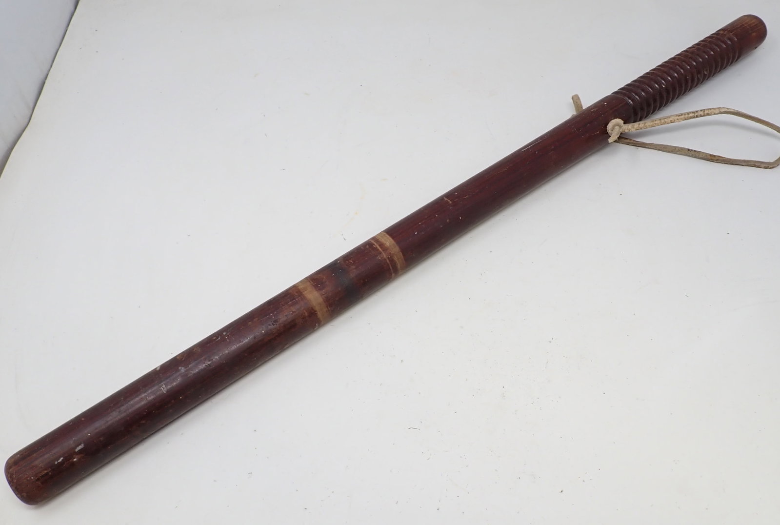Billy Club: Approx 1 1/4" in diameter and 26" long