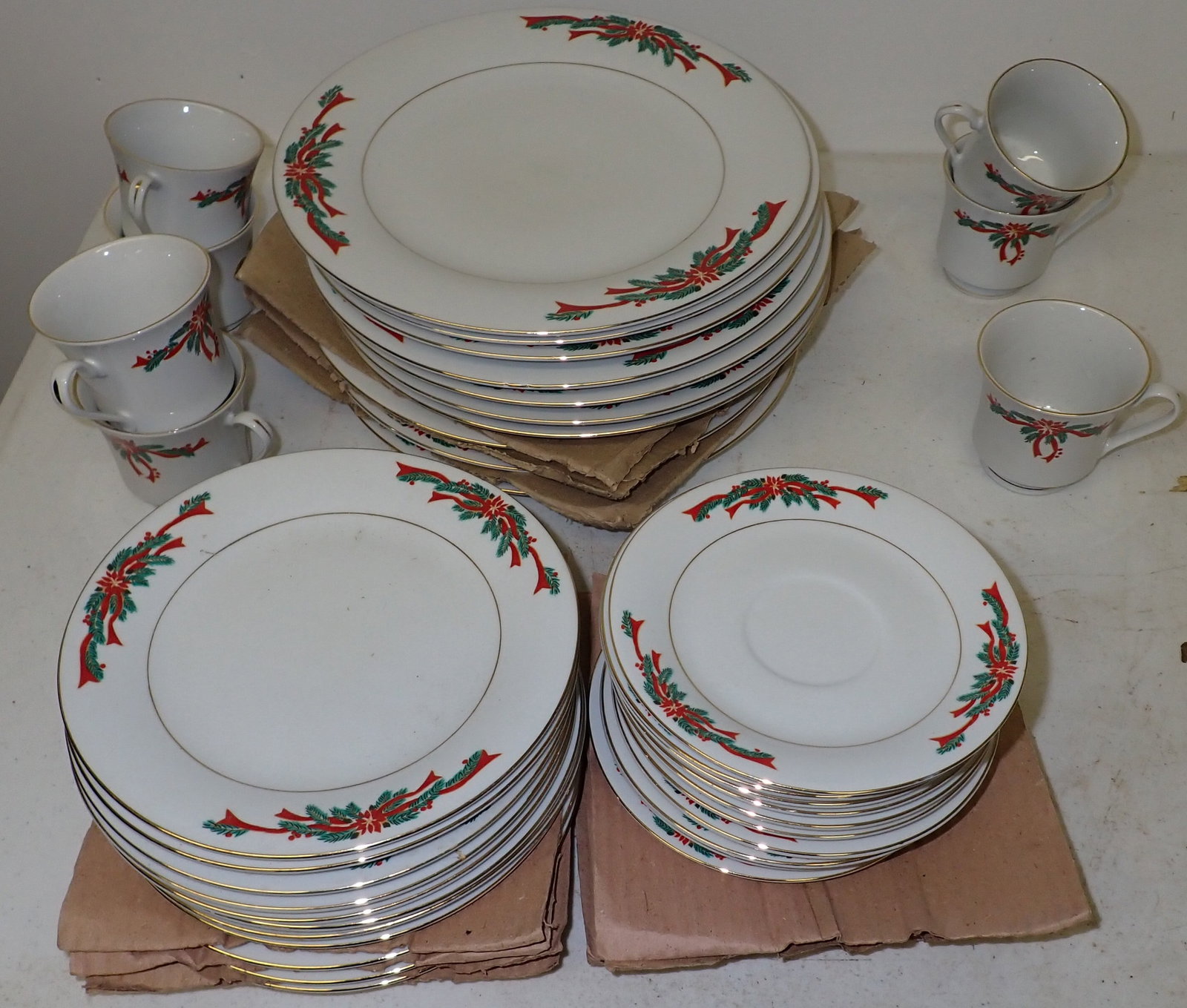 Poinsetta Ribbons Fine China Dinnerware: Largest plates are apprx 10 3/4" in diameter. No shipping