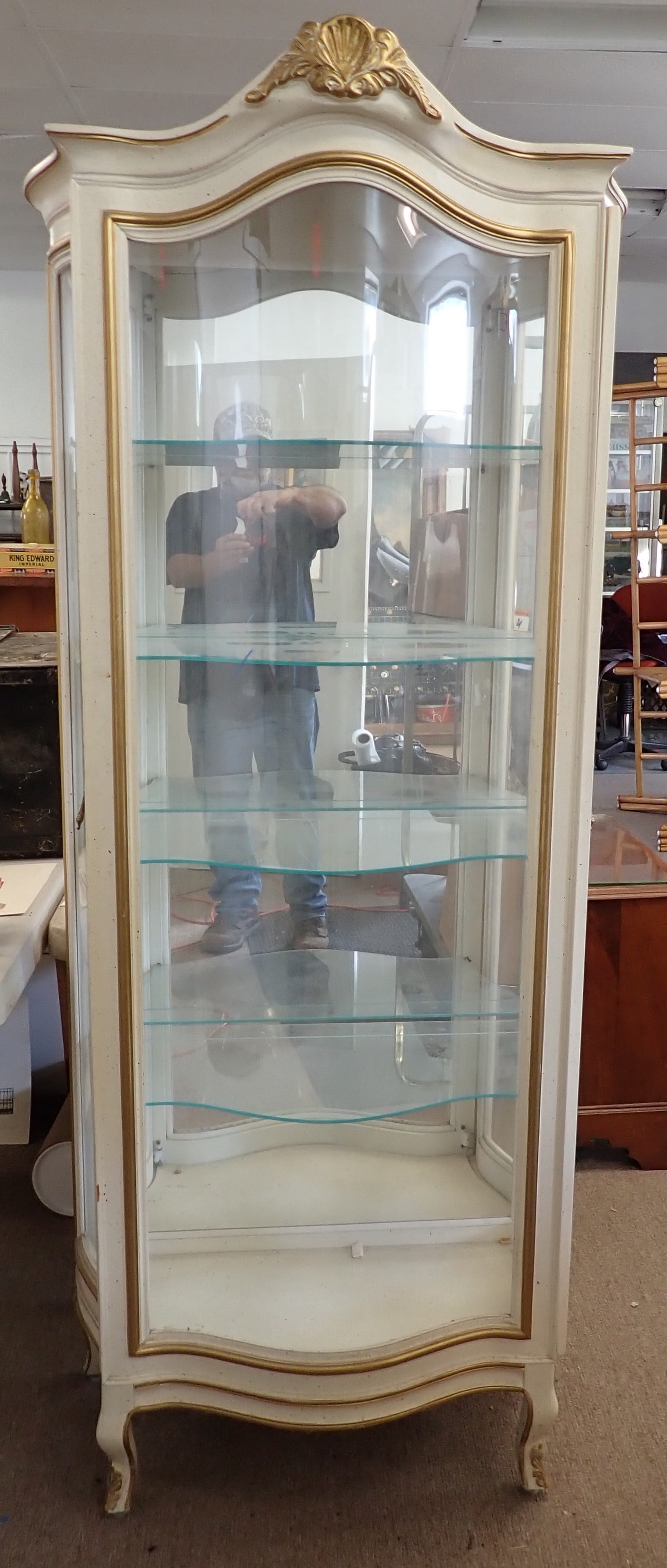 Curio Cabinet: Approx 17 3/4" x 31 1/2" x 73 1/2" tall. Both side doors open. Front door does not open. The front and side panels seem to be plexiglas. Pick up after 1pm only ! No shipping ! Bring help to load