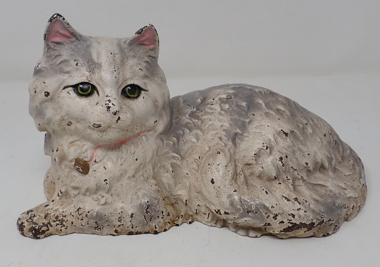 Cast Iron Cat Doorstop: Apprx 10 1/2" long and 6" tall.