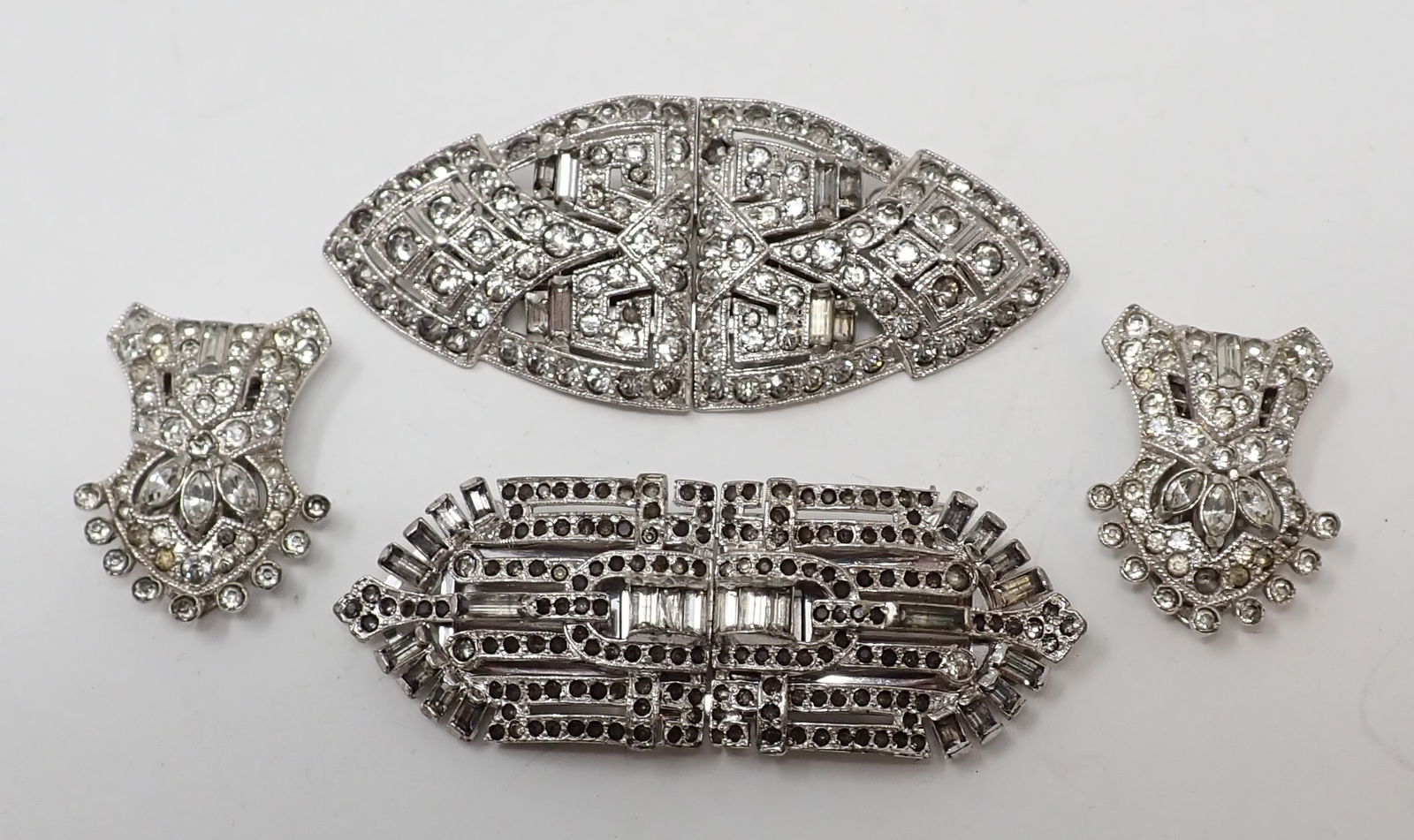 White Metal and Rhinestone Duets and Clips: Includes a Coro Duette; an unmarked duette; and a pair of unmarked dress clips.