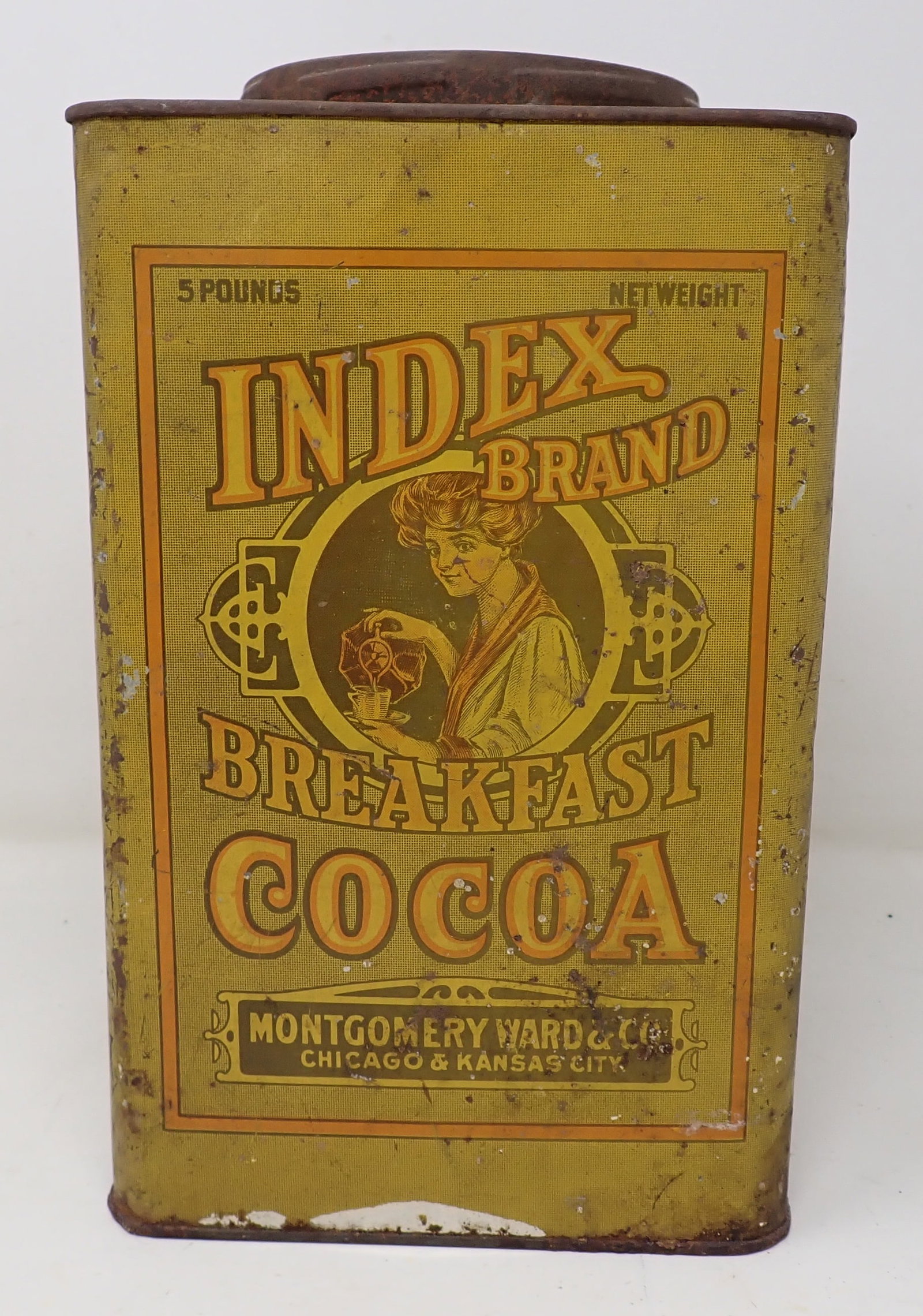 Montgomery Ward Idex Brand Cocoa Tin: Tin is approx 6 1/8" x 6 1/8" x 10 1/4" tall.