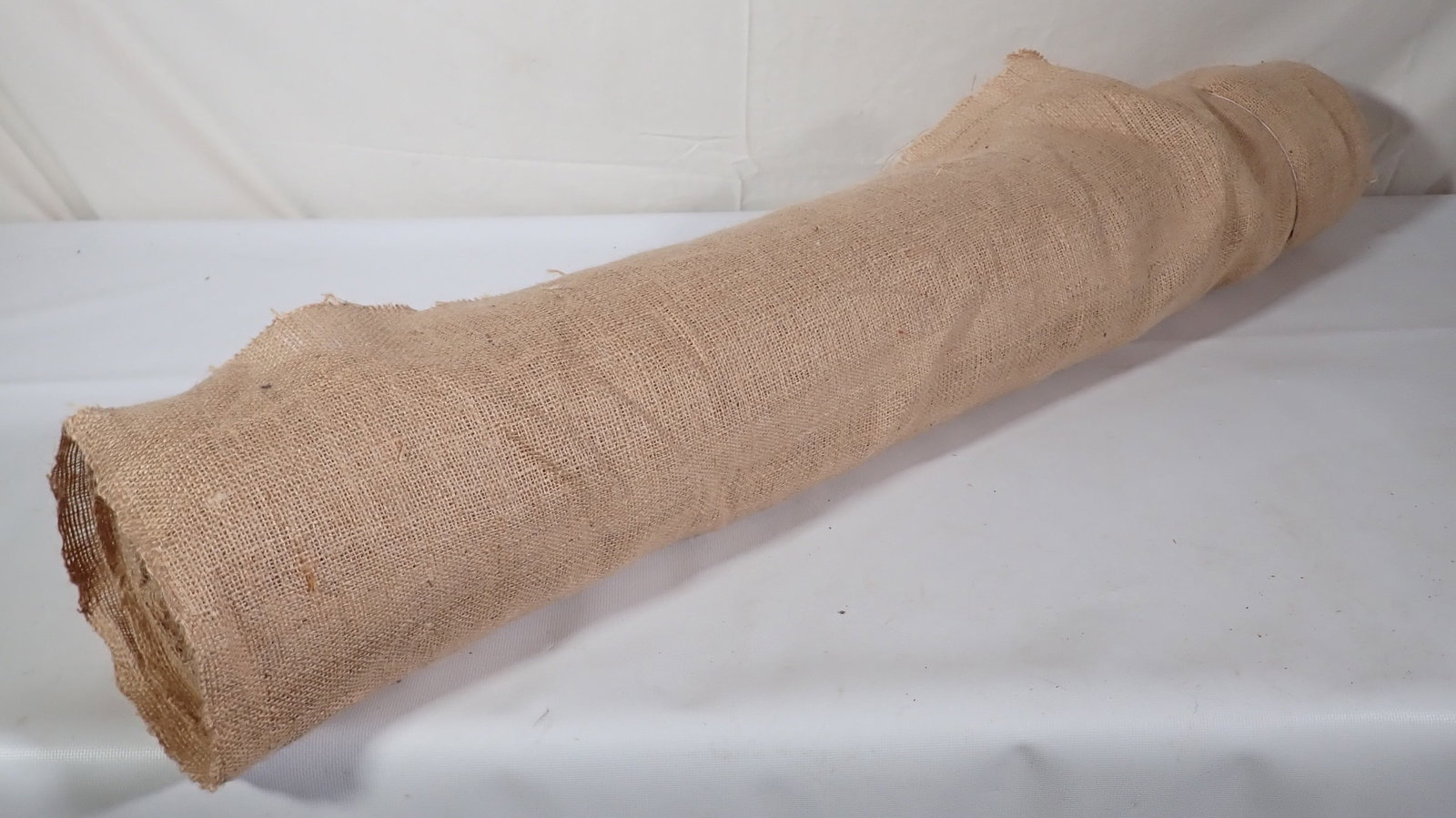 Roll of Burlap: Burlap is approx 40" wide . Length is not known. Roll is approx 6" in diameter ( as pictured). No shipping