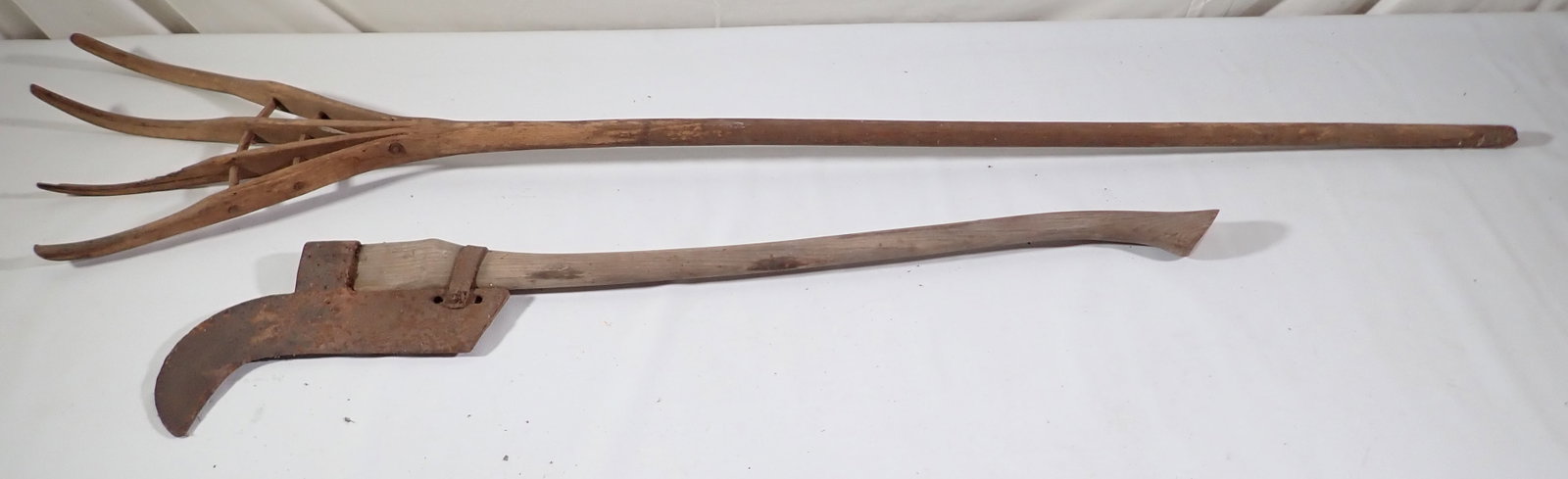 Brush Axe & Hay Fork: Axe is apprx 40 1/2" long. NO shipping