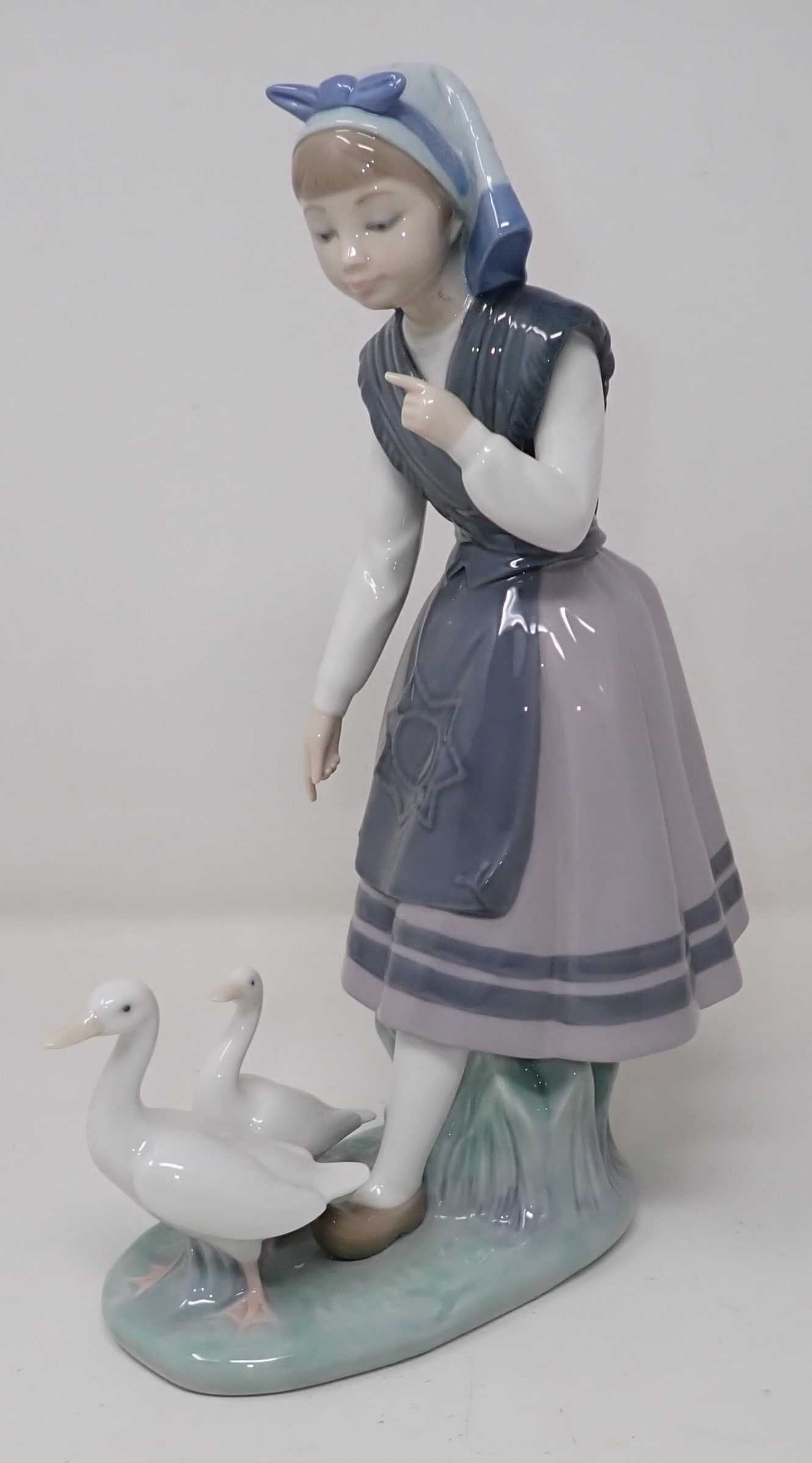 Lladro Girl with Geese: Apprx 10 3/4" tall.