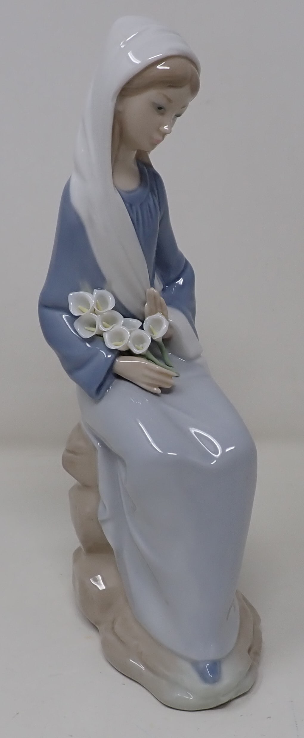 Lladro Girl with Lillies: Apprx 9 1/2" tall.