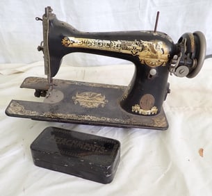 Singer Sewing Machine & Attachments