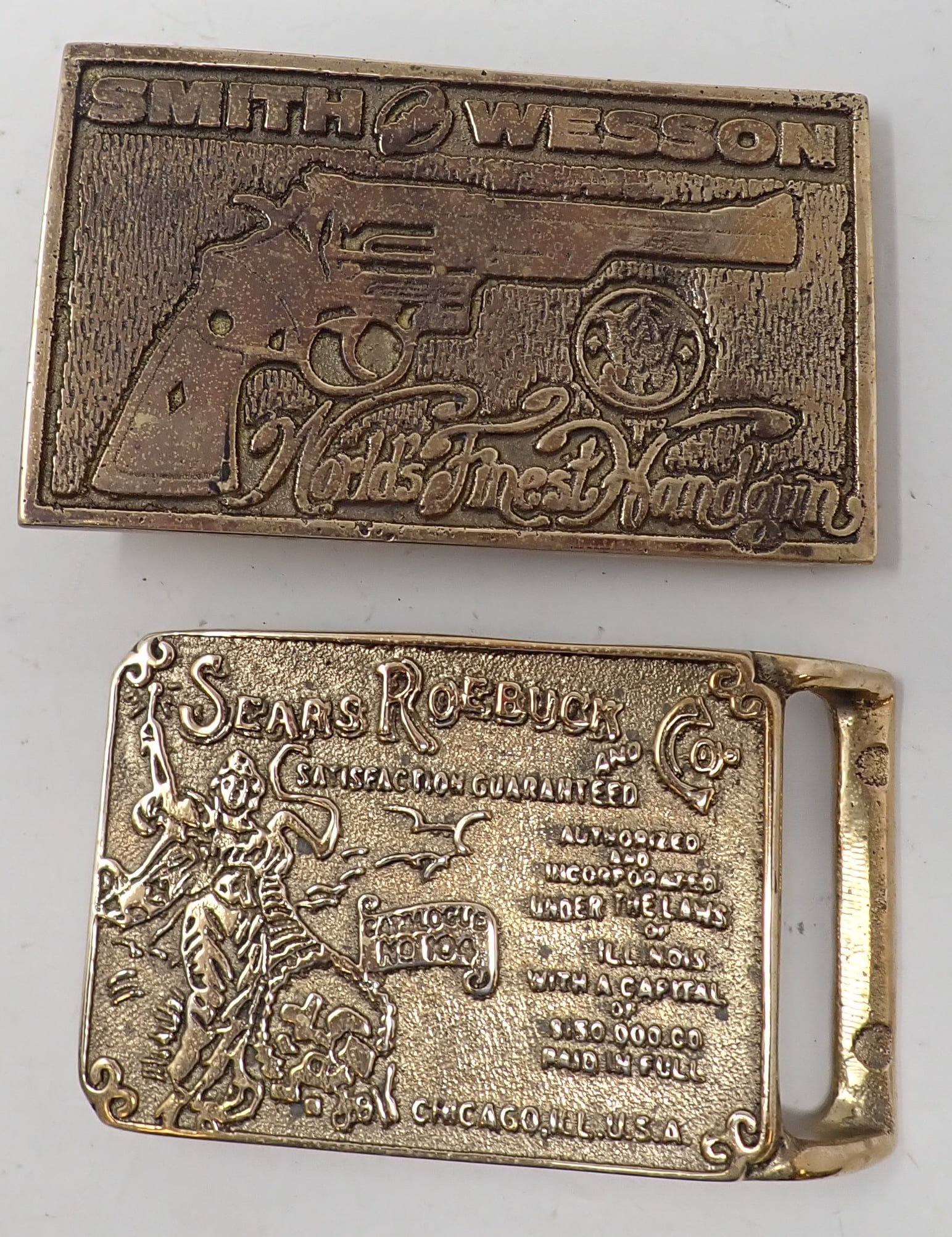 Sears Roebuck Smith & Wesson Belt Buckles: Smith & Wesson is approx 2 1/8" x 3 5/8"