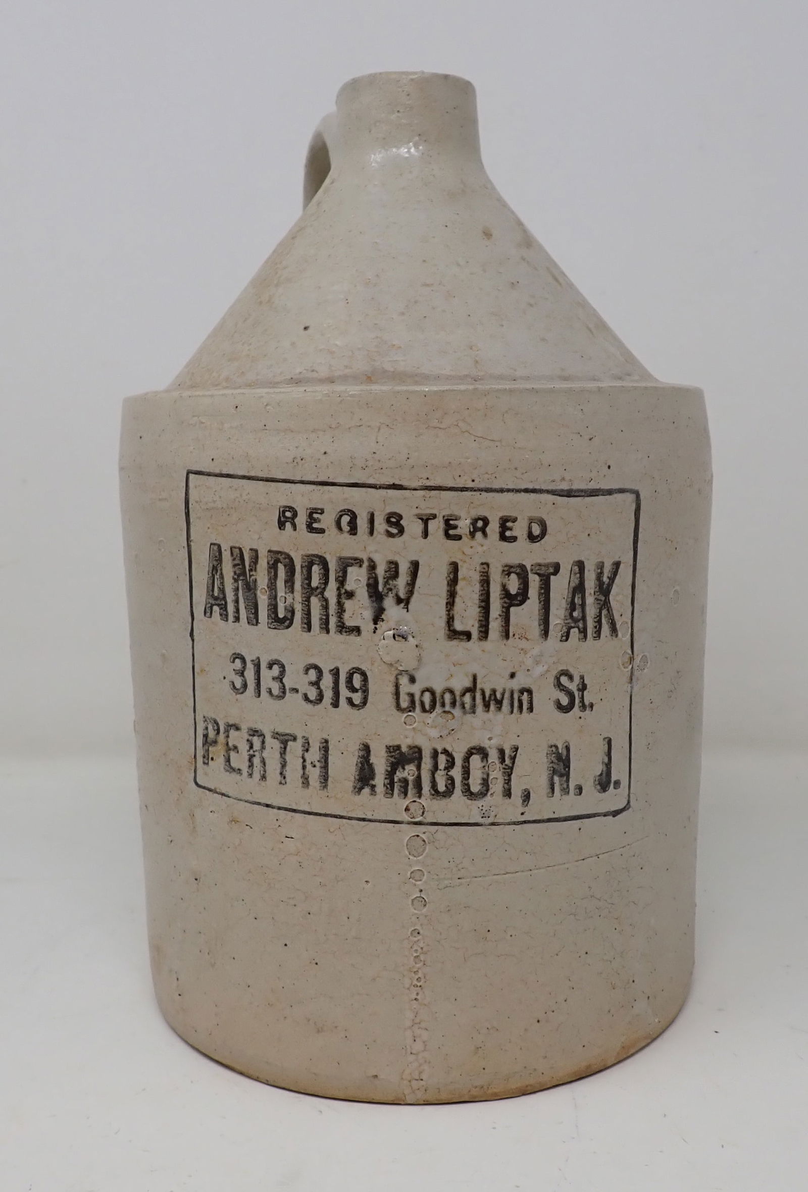 Andrew Liptak Perth Amboy NJ Stoneware Jug: Jug is apprx 5 3/4" in diameter and 9 1/4" tall.