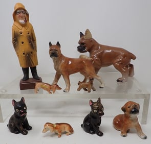 Dog Figurines and Fisherman
