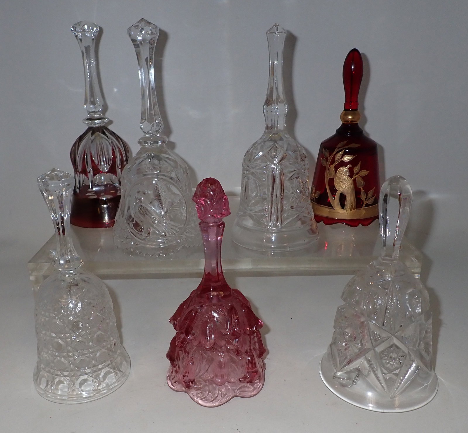 Bells incl Fenton: Tallest is approx 8 1/4" tall. Back right bell is musical.
