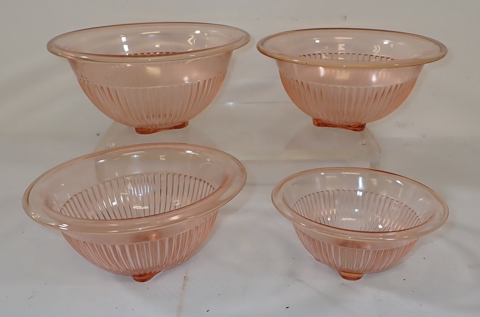 Set of 4 Depression Glass Bowls: Largest is approx 10 1/2" in diameter and 5" tall.