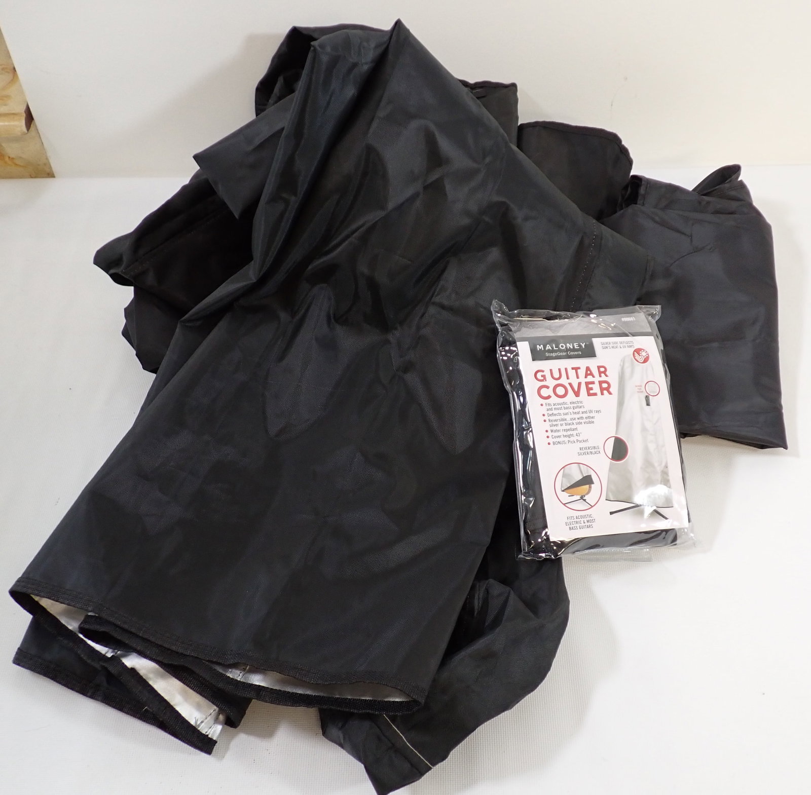 8 Maloney Guitar Dust Covers: One new in packaging
