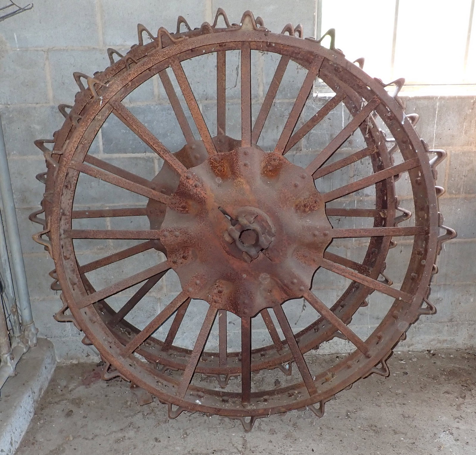 Pair of Steel Tractor Wheels: Approx 6" wide, 53 1/2" in diameter. Not including the 2 5/8" knobs on the edge of the rim. Shaft opening is approx 2 1/4". Must bring proper help and equipment to remove. These are HEAVY !!! No shipp