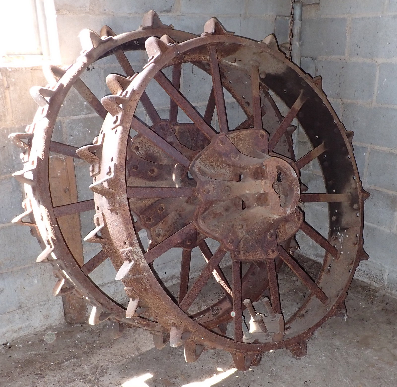 Pair of Steel Tractor Wheels: Apprx 8" wide and 51" in diameter ( Not including the 2 3/4" knobs attached to rim. Bring proper help and equipment to remove. No shipping ! THESE ARE HEAVY !