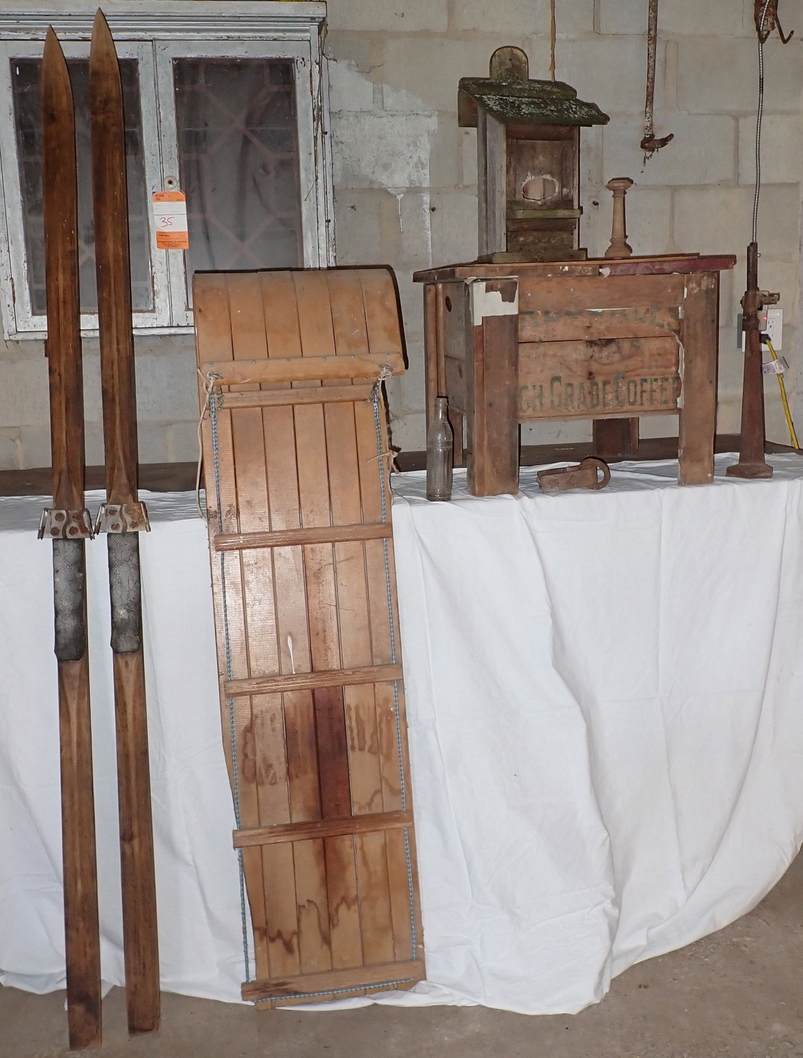 Wooden Skis Sled & Misc: Does not include cabinet on wall. Must take all. Pick up and remove BEFORE 1pm.