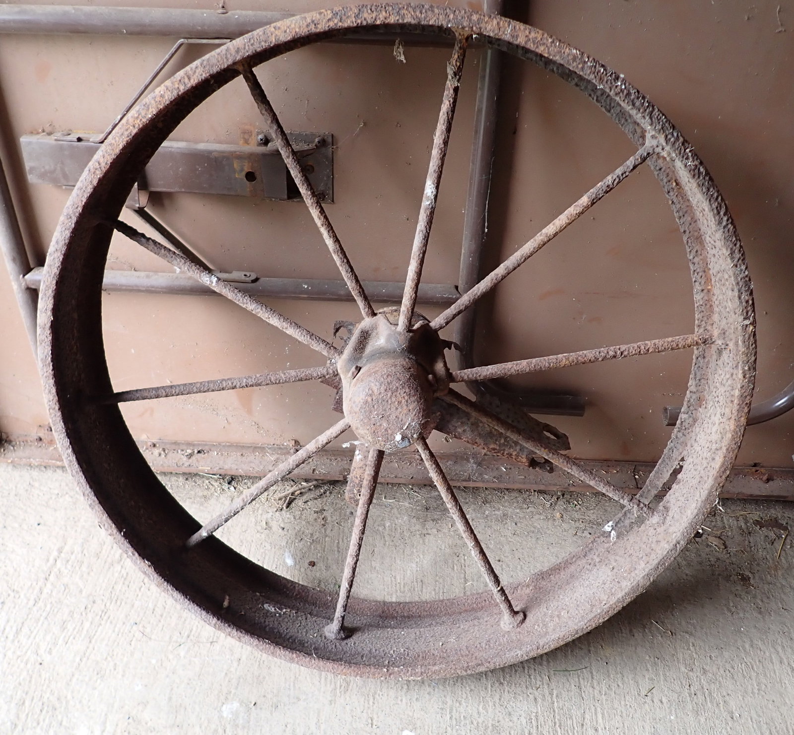 Steel Wagon Wheel: Apprx 26" in diameter and 5" wide. No shipping ! Pick up at 9:30 am only