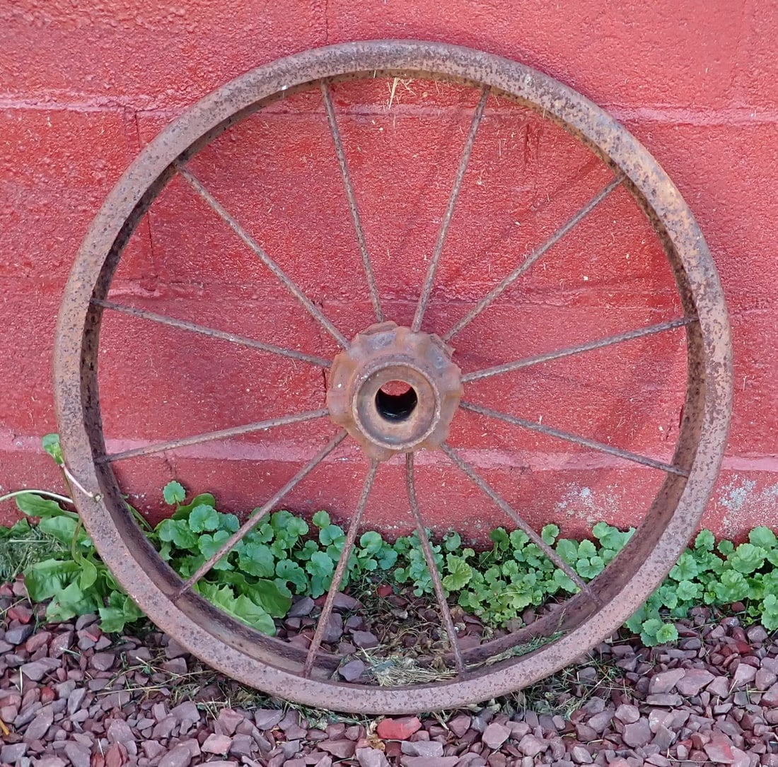 Steel Farm Implement Wheel: Apprx 3 3/4" wide and 25 1/2" in diameter. No shipping