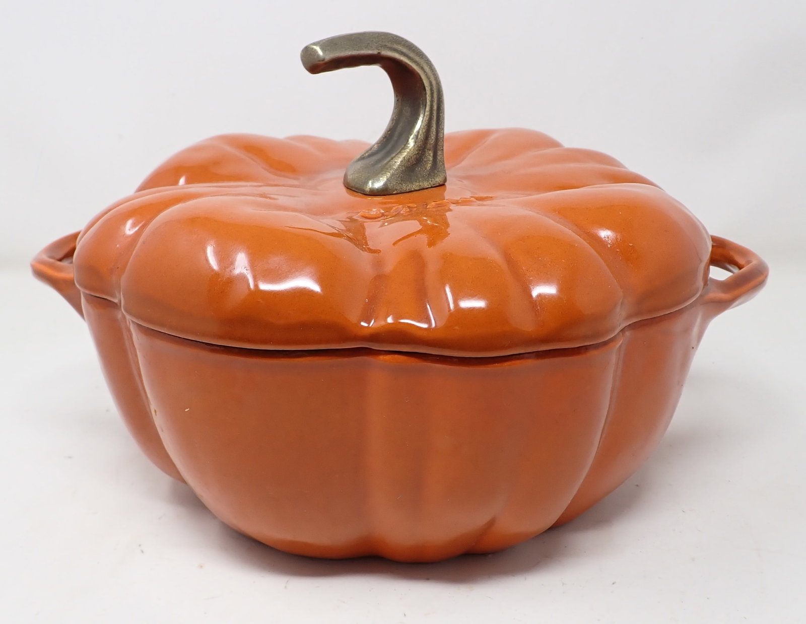 Staub Cast. Iron Pumpkin Dutch Oven: Approx 9 7/8" x 12" x 8" tall.