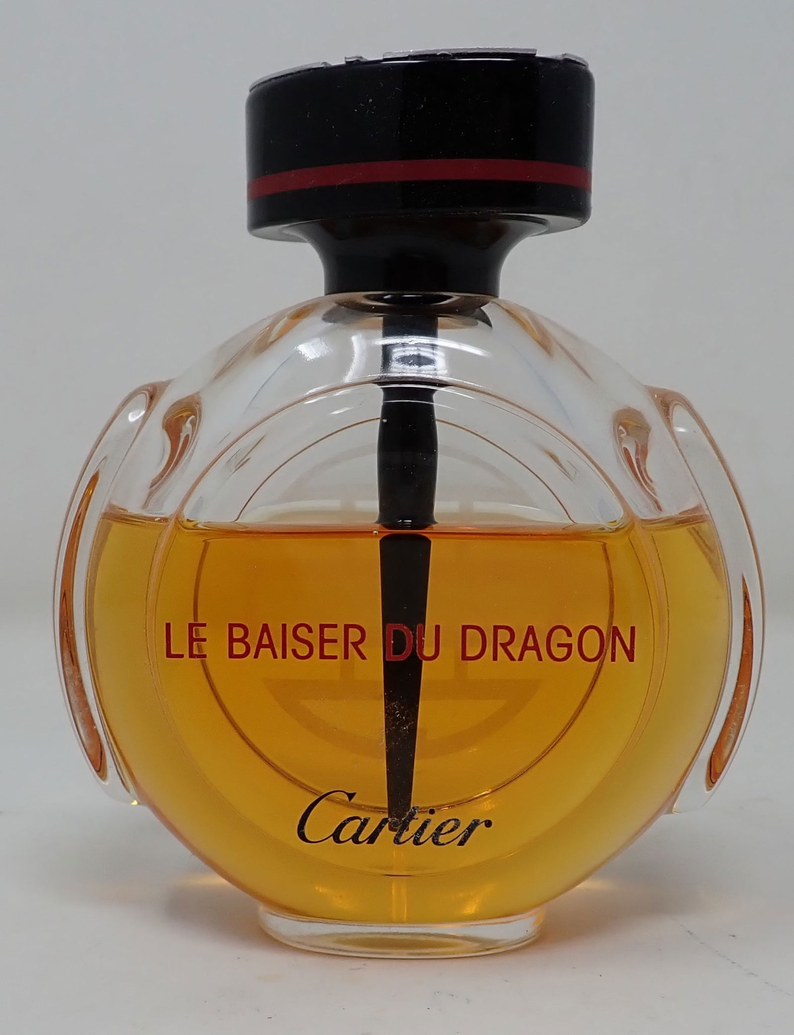 Le Baiser Du Dragon Cartier 3.3oz Perfume: Between 1/2 and 3/4 full. No international shipping