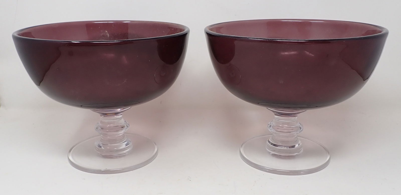Pair of William Yeoward Amethyst Compotes: Approx 8 1/2" in diameter and 6 3/4" tall.