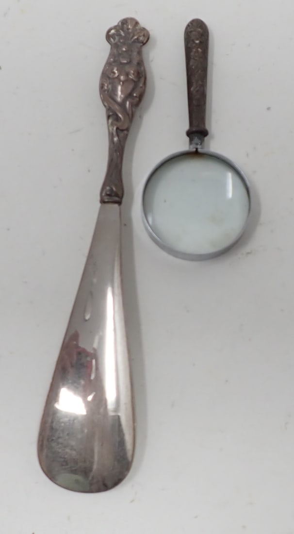 Shoe Horn & Magnifying Glass w/ Sterling Silver Handles: Both have Sterling Silver Handles. She horn is apprx 7 1/8" long