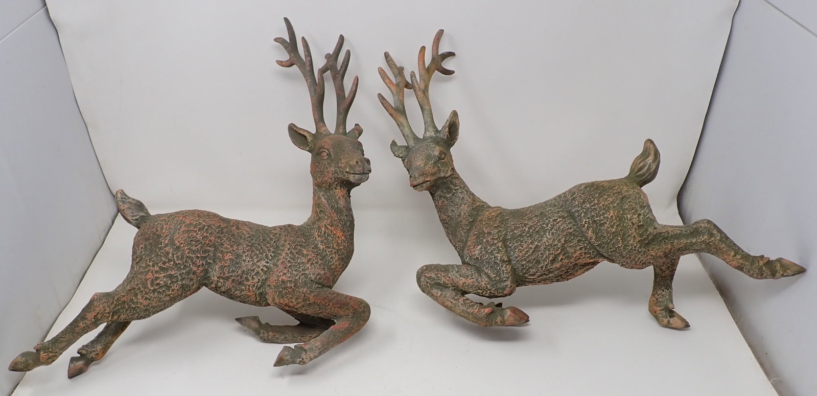 2 Resin Deer: Approx 14 1/2" long and 14 1/2" tall. They are meant to be displayed on a post.